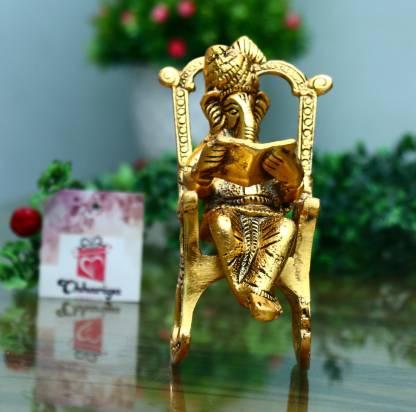 Golden Lord Ganesha Sitting On A Rocking Chair