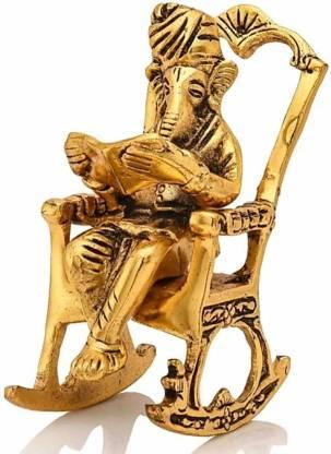 Golden Lord Ganesha Sitting On A Rocking Chair