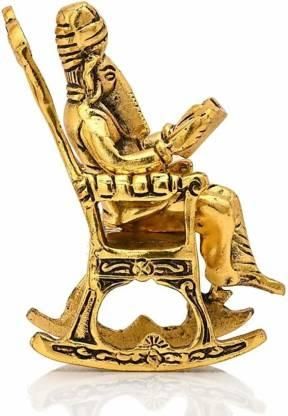 Golden Lord Ganesha Sitting On A Rocking Chair